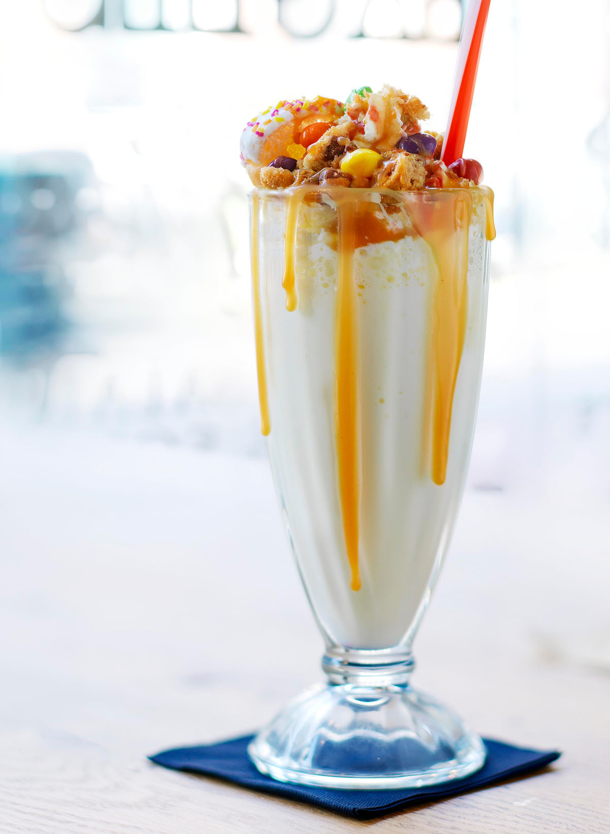 Food photography of glass of sweets milk shake made by Studio_m Photography Amsterdam