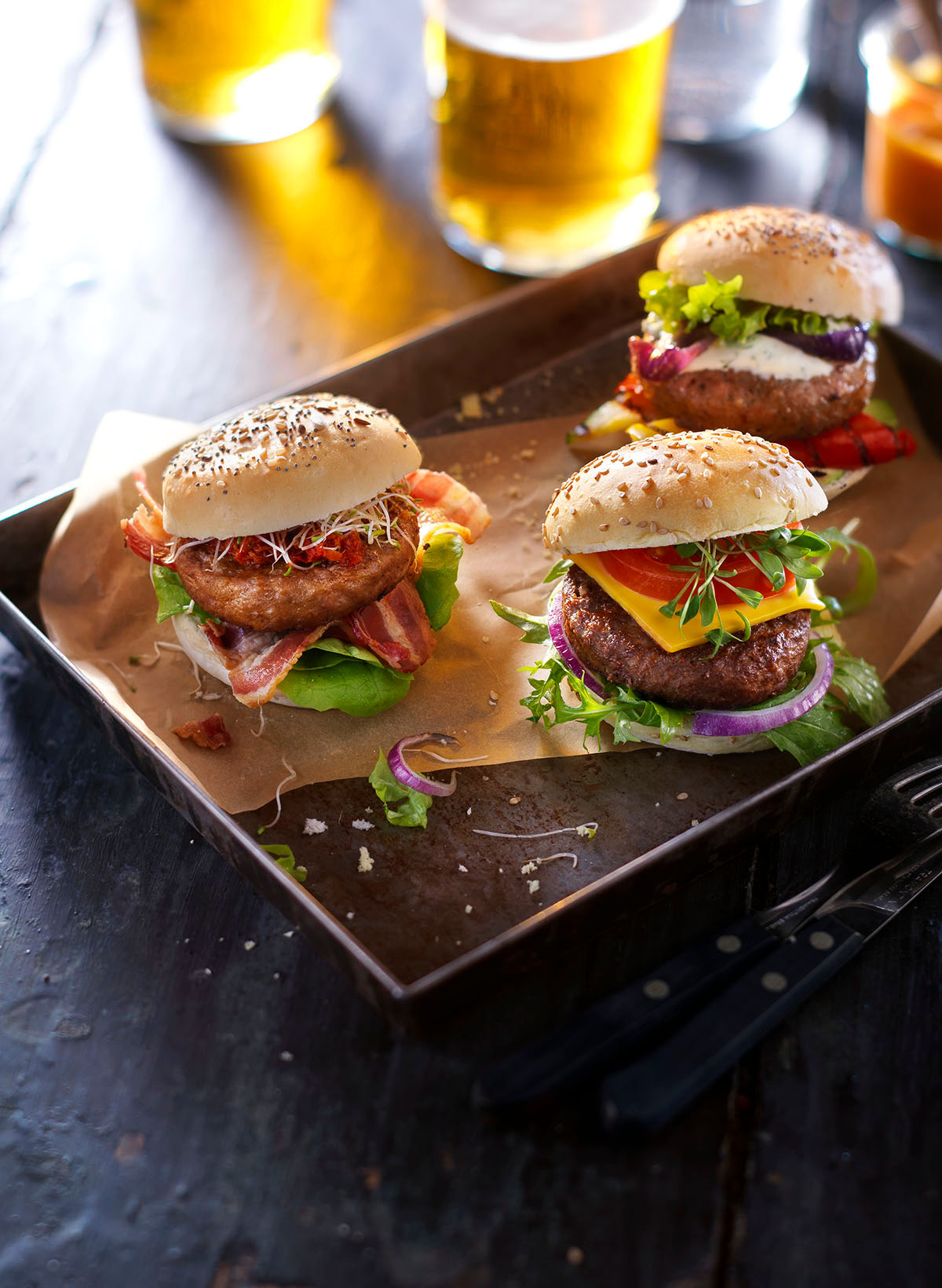 Food photography of three of TopKing's hamburgers made by Studio_m Photography Amsterdam