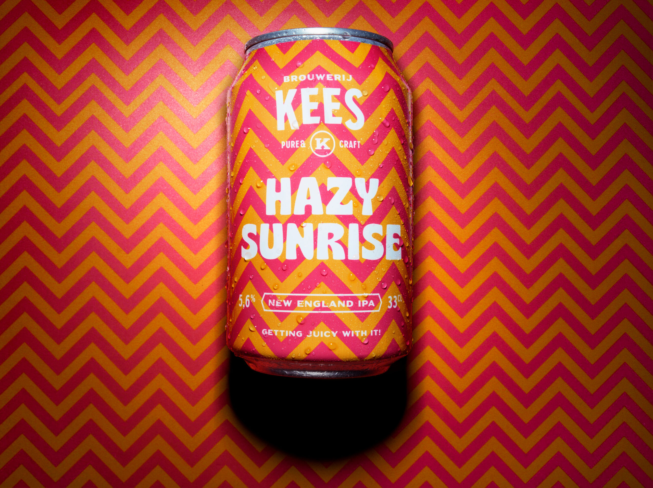 Still image by STUDIO_M of a vibrant Kees Bier can with bold zig-zag patterns, highlighted by precise studio lighting.